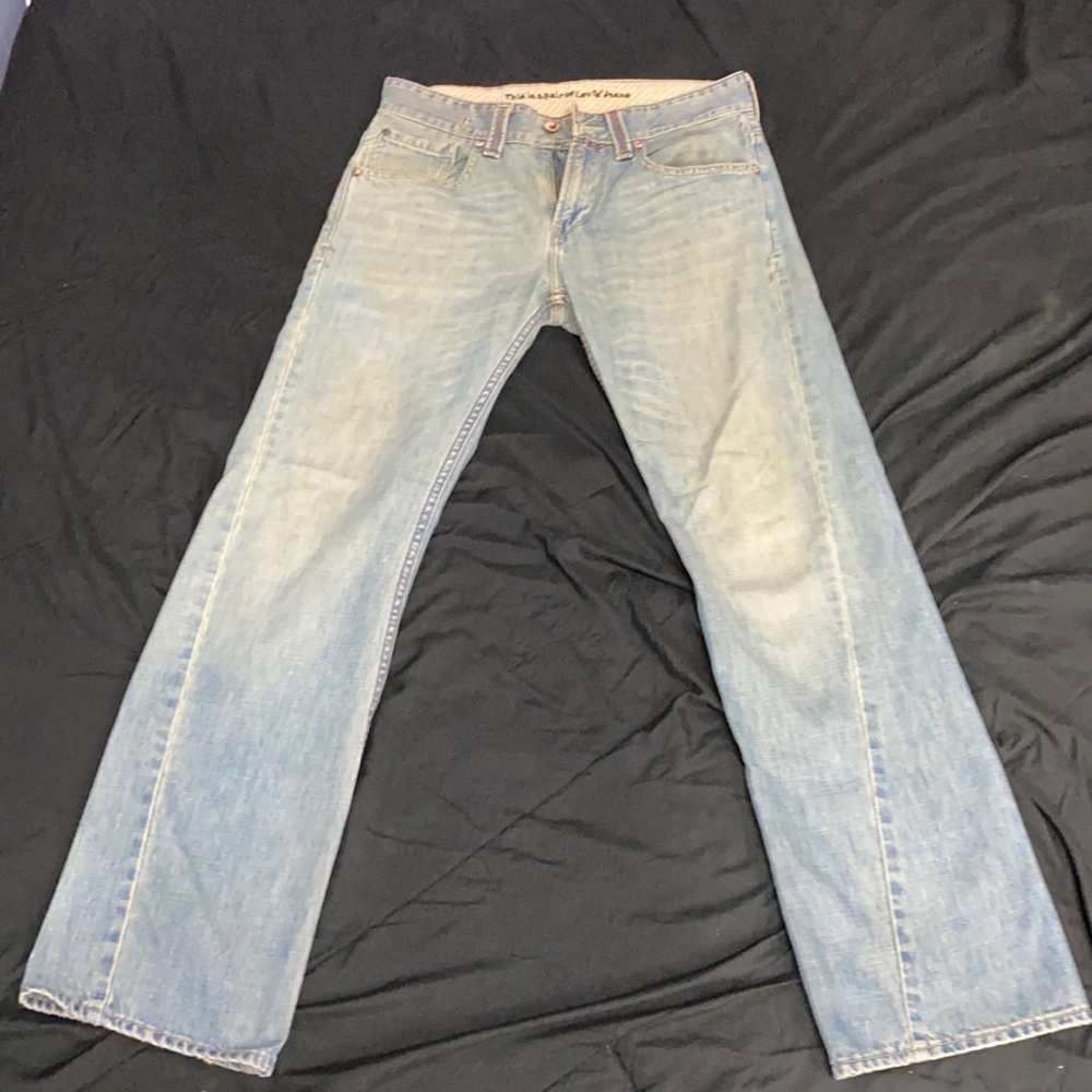 Well worn Levi’s straight fit jeans. 31 x 32